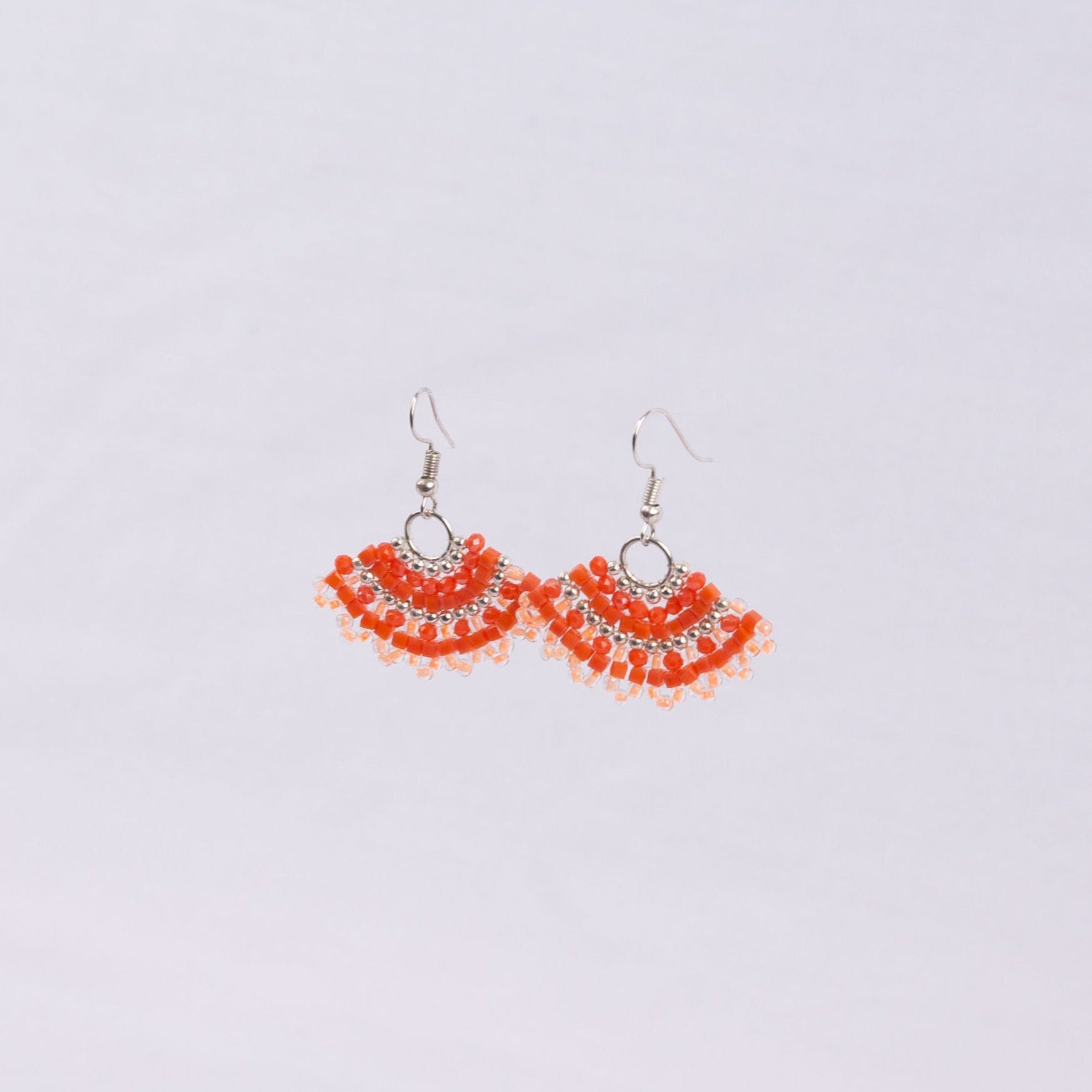 Pair of orange fan-shaped beaded earrings