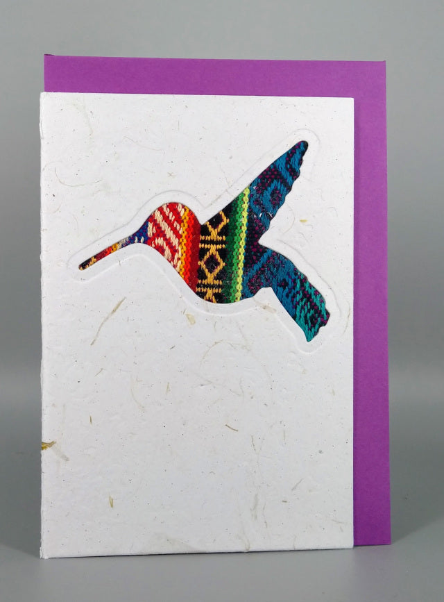 An ethical, handmade hummingbird card, made from vibrant Ecuadorian fabrics.