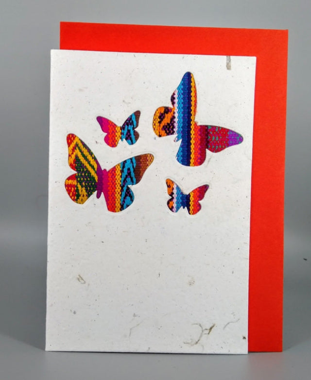 An ethical, handmade mini butterflies card, made from vibrant Ecuadorian fabrics.