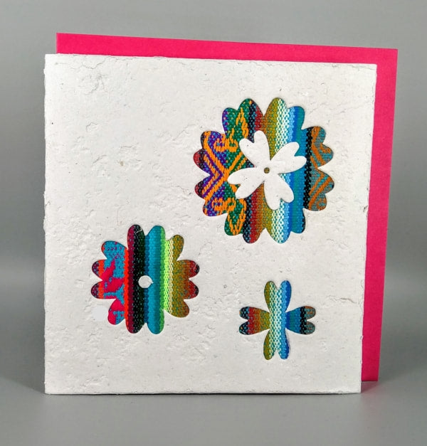 An ethical, handmade three flowers card, made from vibrant Ecuadorian fabrics.