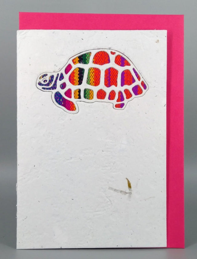 An ethical, handmade Tortoise card, made from vibrant Ecuadorian fabrics.