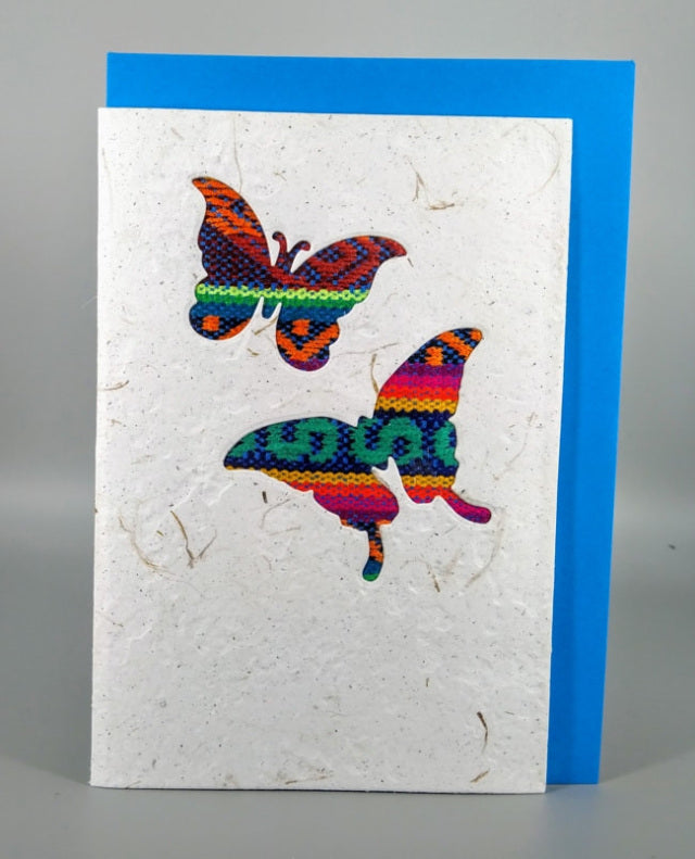 An ethical, handmade two butterflies card, made from vibrant Ecuadorian fabrics.