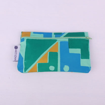 Green and blue geometric patterned rectangular pencil case with a purple zip.