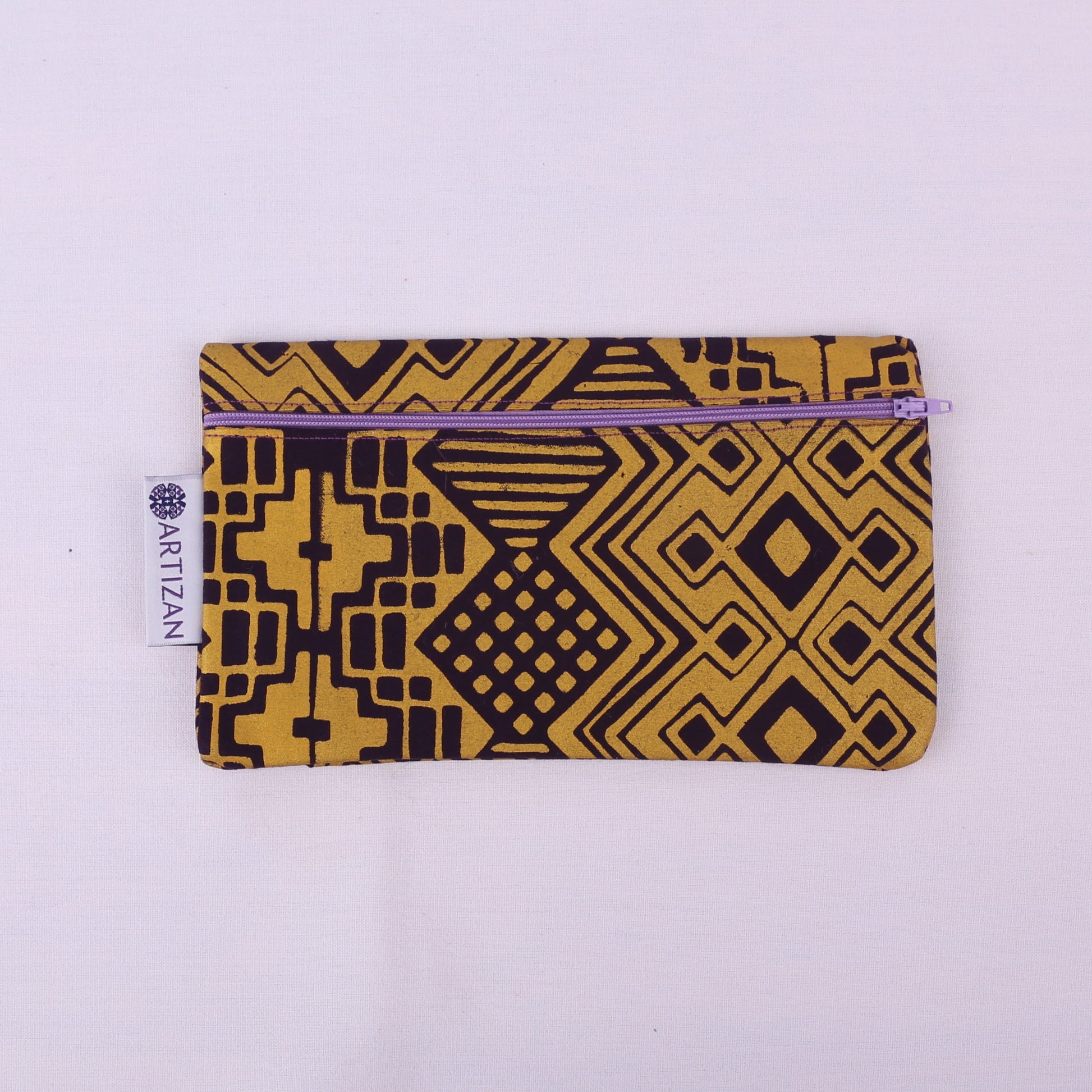Gold and purple patterned rectangular pencil case with a purple zip.