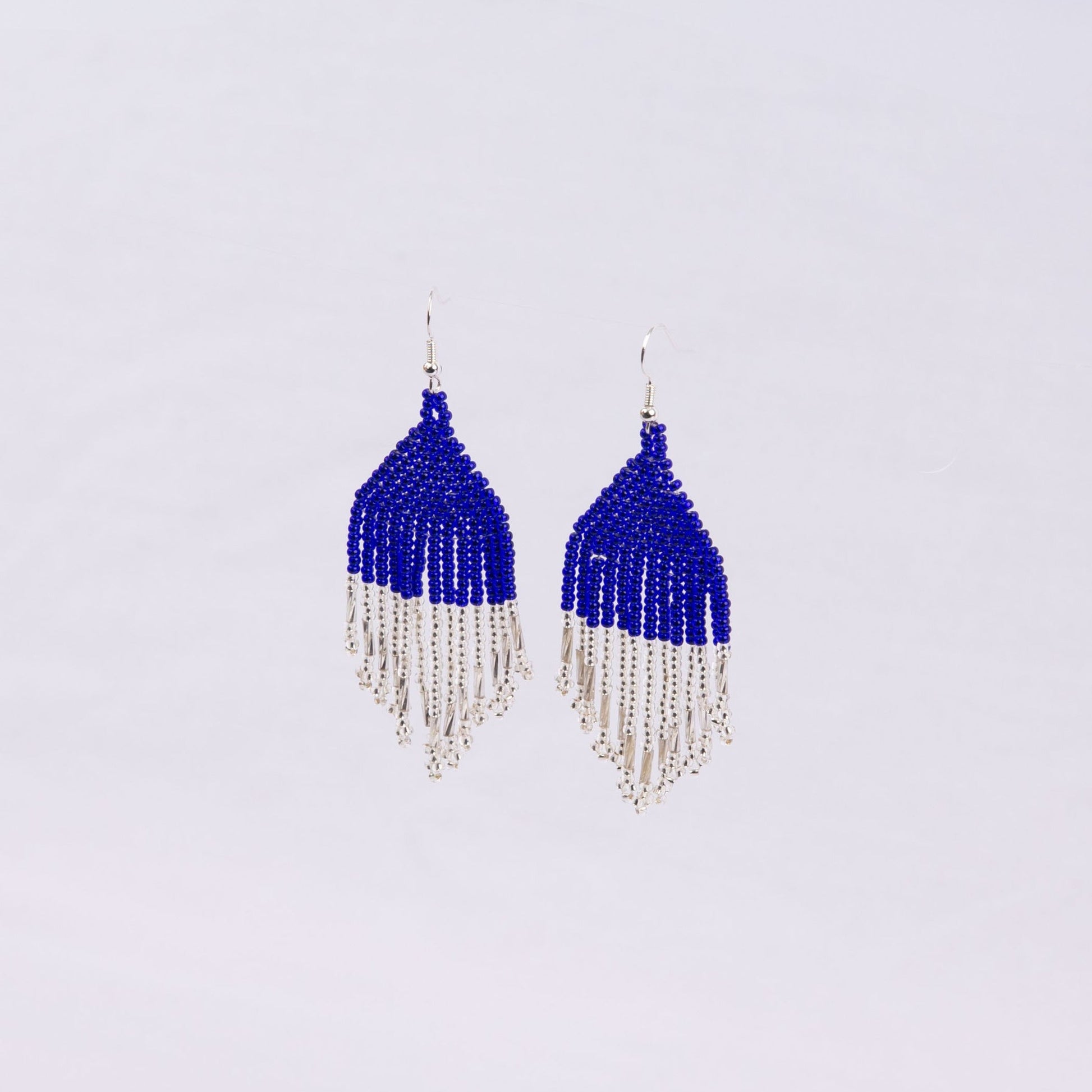 Pair of beaded earrings with blue top and silver fringe