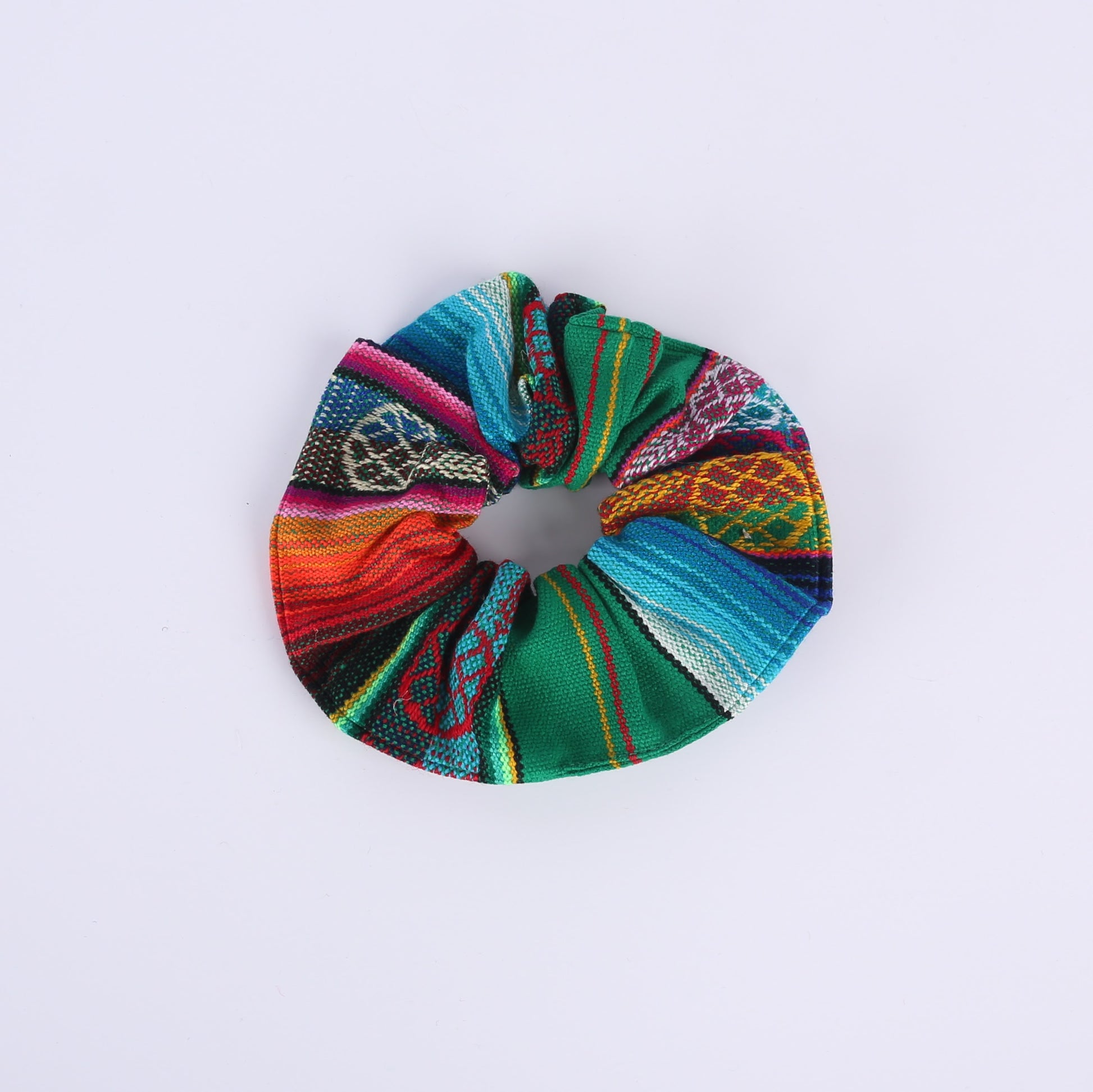 Green and colourfully patterned scrunchie